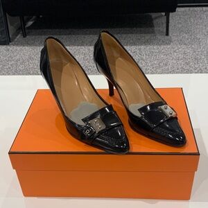 Hermes. Classic Black Patent Leather Pointed Toe Pumps with Decorative Buckle